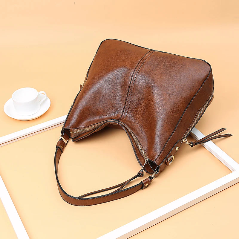 Sac à main femme à poche latérale