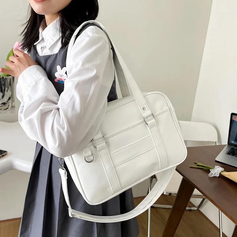Sac bandoulière femme à poche extérieure