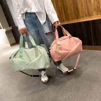 Sac de sport femme à poche humide