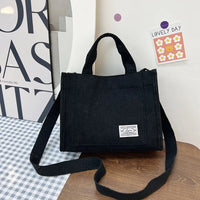 Sac bandoulière carré en velours côtelé
