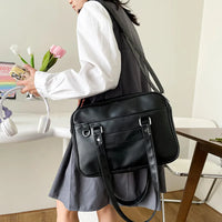 Sac bandoulière femme à poche extérieure