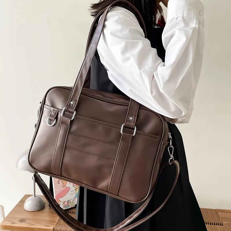 Sac bandoulière femme à poche extérieure