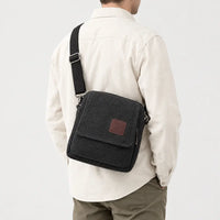 Sac bandoulière homme en toile - noir - 2 porte-arriere